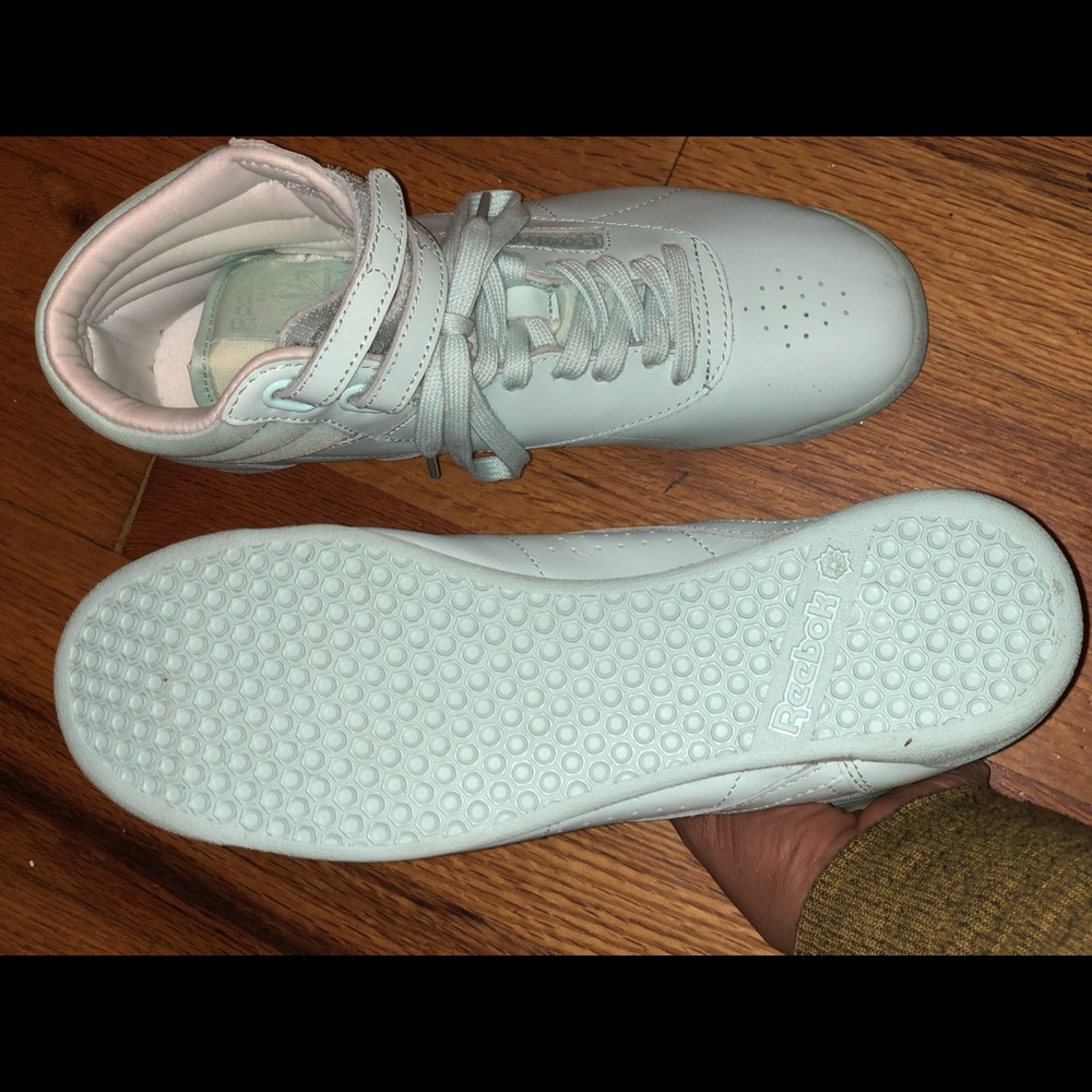 Reebok hightop sneakers.